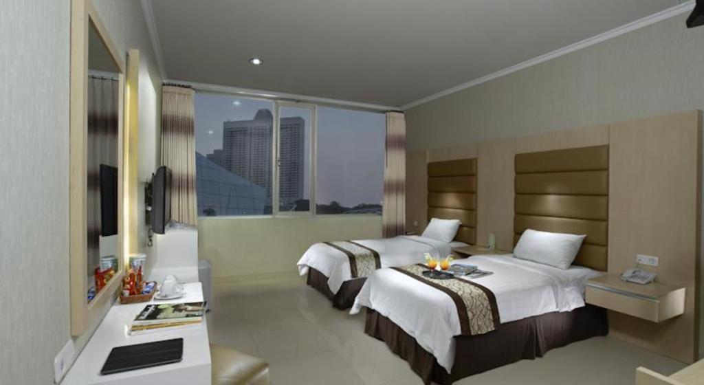 Oyo 235 Maumu Hotel & Lounge Surabaya Exterior photo